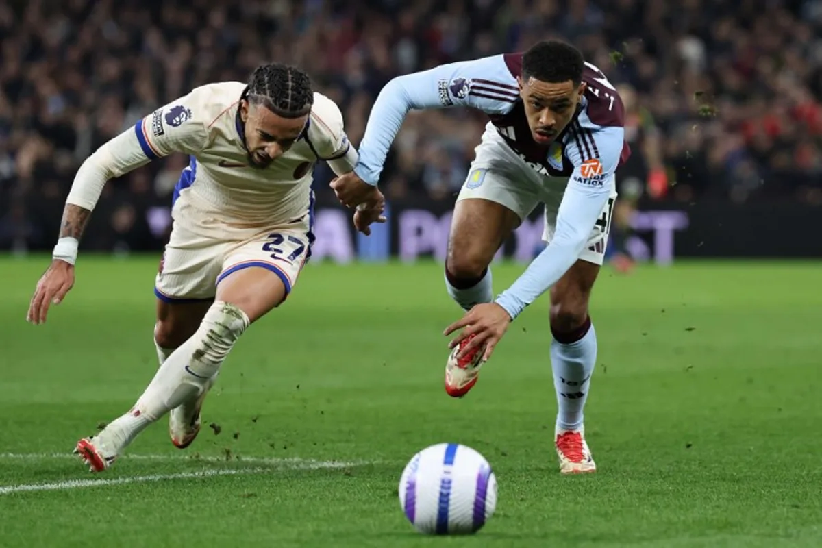 Chelsea's French defender #27 Malo Gusto (L) vies with Aston Villa's English midfielder #41 Jacob Ramsey (R) during the English Premier League football match between Aston Villa and Chelsea at Villa Park in Birmingham, central England on February 22, 2025.  Darren Staples / AFP