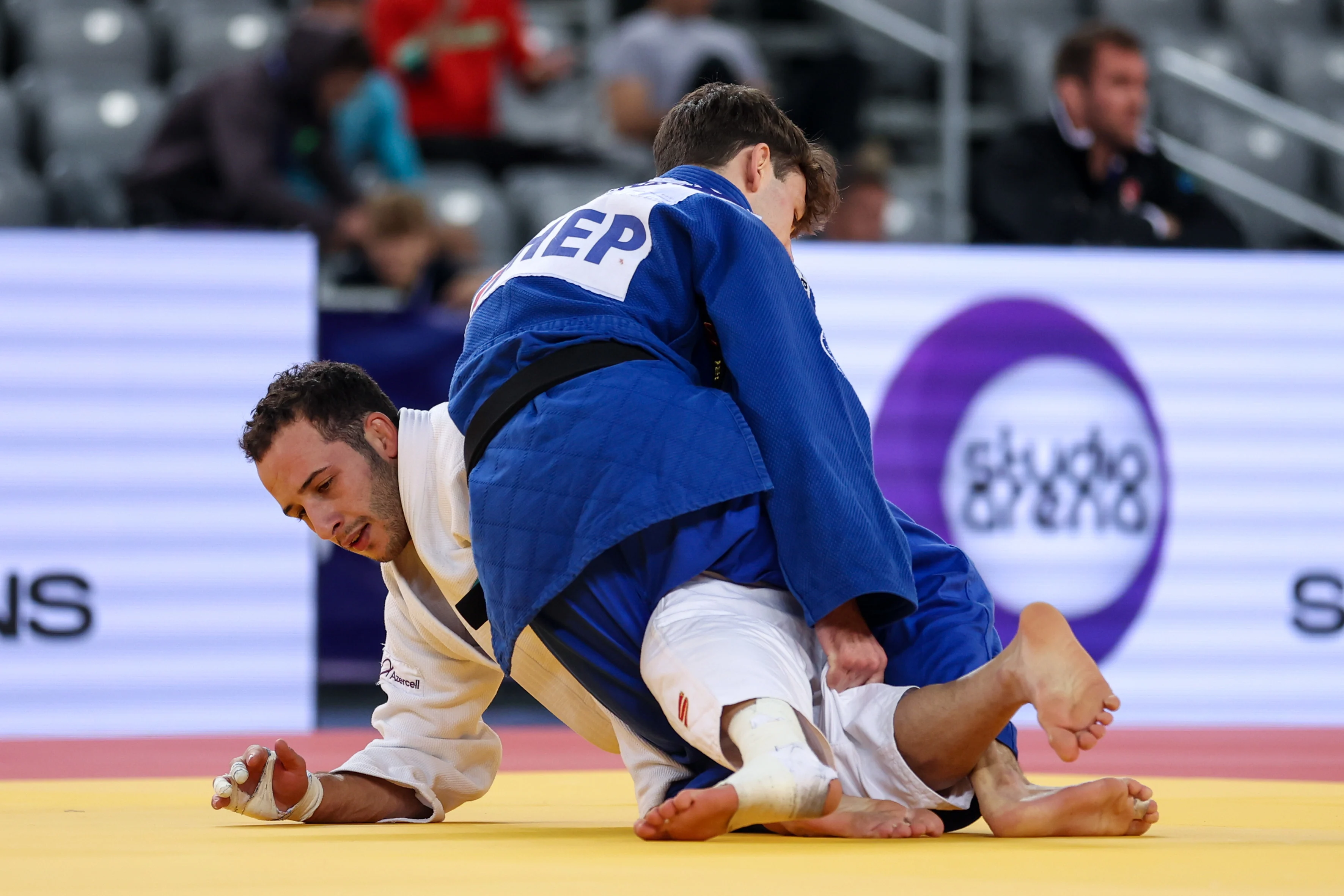 Ahmad Yusifov of Azerbaijan (white) competes against Olivier Naert of Belgium (blue) in the Men's -60 kg during day 1 of IJF Judo Grand Prix Zagreb 2024 at Arena Zagreb on September 13, 2024 in Zagreb, Croatia. Photo: Igor Kralj/PIXSELL BELGIUM ONLY