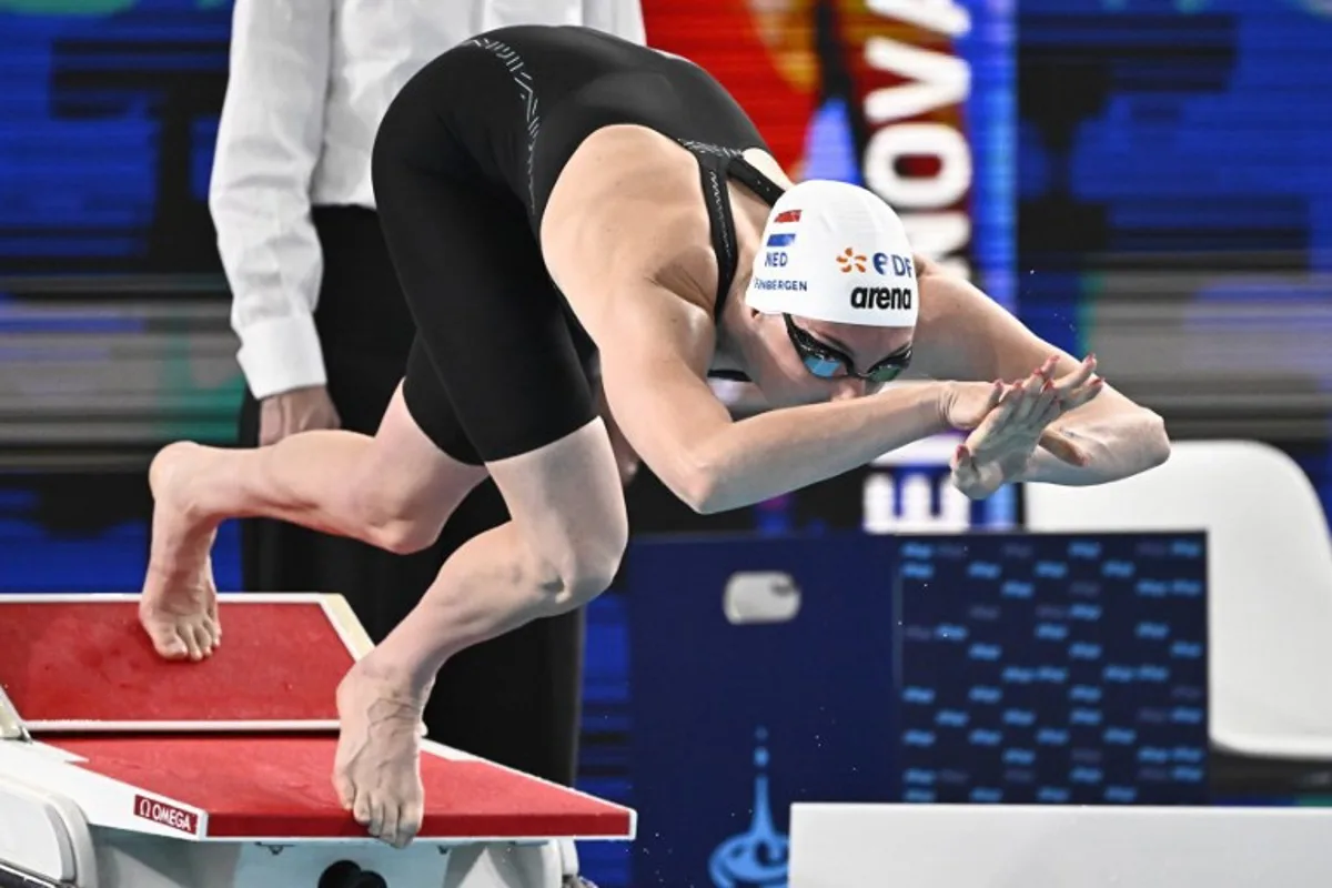 Netherlands' Marrit Steenbergen dives as she takes the start of a semi-final of the women's 100m freestyle swimming event during the LEN European Aquatics Championships at the Olympic Aquatic Centre in Saint-Denis, northern suburbs of Paris, on August 10, 2026. JULIEN DE ROSA / AFP