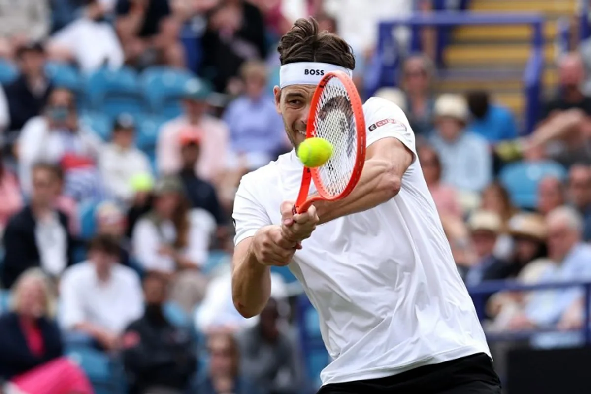 US player Taylor Fritz returns against US player Jenson Brooksby during their men's singles final tennis match on day six at the Lexus Eastbourne International tennis tournament in Eastbourne, southern England, on June 28, 2025. Adrian Dennis / AFP