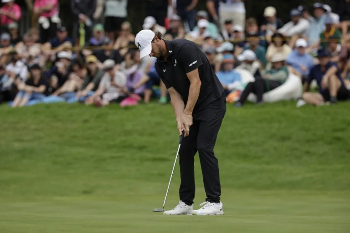4Aces GC's Belgian player Thomas Pieters holes a putt on the 16th green of the fourth day of the LIV Golf South Africa tournament at The Club in Steyn City on March 22, 2026. WIKUS DE WET / AFP