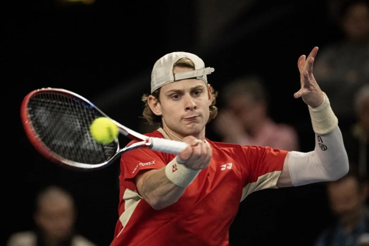 Belgian Zizou Bergs returns the ball to France's Ugo Humbert during their semi-final simple tennis match at the Marseille Open 13 ATP World Tour in Marseille, southern France on February 15, 2025.  MIGUEL MEDINA / AFP