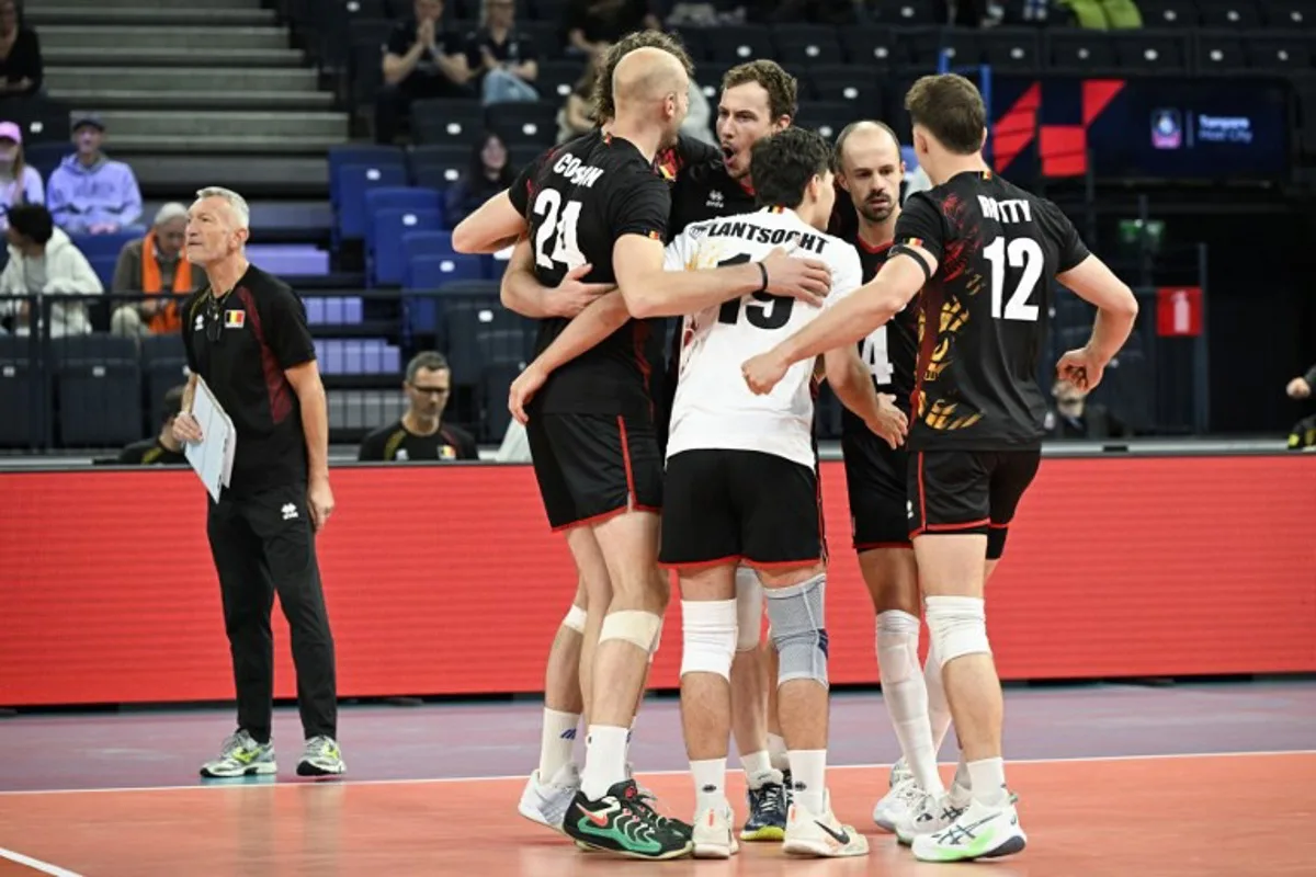 Team Belgium celebrates during the men's volleyball European Championships Pool C match Netherlands vs Belgium in Tampere, Finland, on September 11, 2026.   Emmi Korhonen / Lehtikuva / AFP