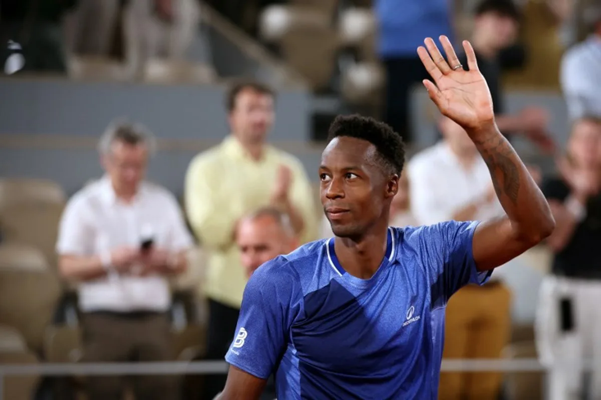 France's Gael Monfils acknowledges the crowd at the end of his men's singles match against France's Hugo Gaston on day 2 of the French Open tennis tournament on Court Philippe-Chatrier at the Roland-Garros Complex in Paris on May 25, 2026. ALAIN JOCARD / AFP