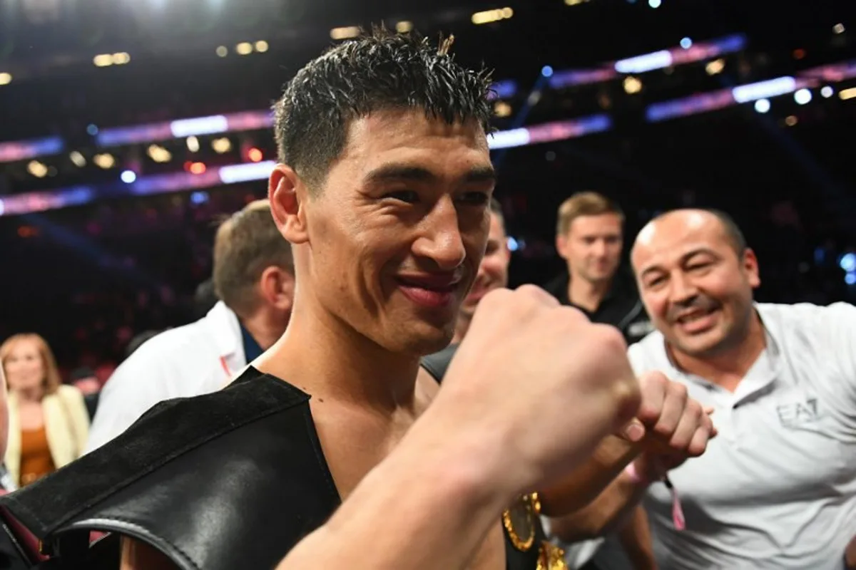 Russian boxer Dmitry Bivol celebrates after defeating Mexican boxer Canelo Alvarez during their light-heavyweight world title boxing match at T-Mobile Arena in Las Vegas, Nevada, May 7, 2022.  Patrick T. FALLON / AFP