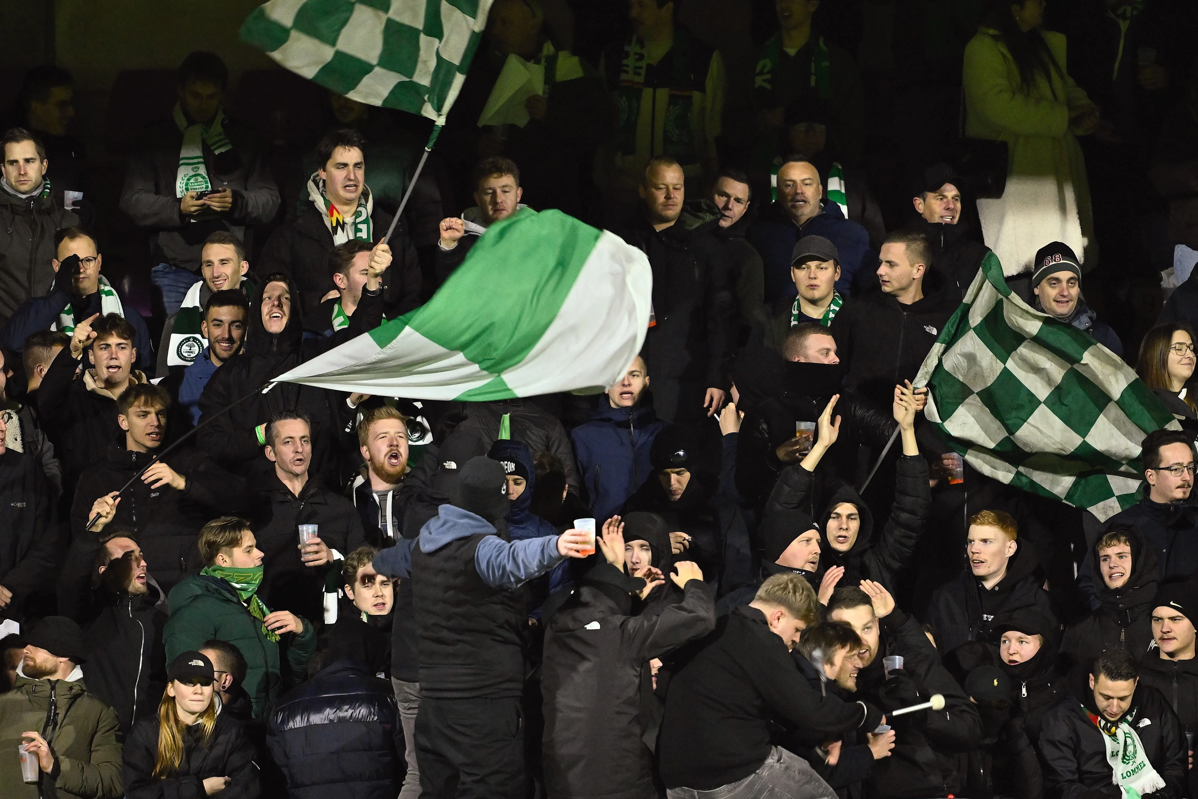 Lommel's supporters pictured during a soccer game between Patro Eisden and Lommel SK, in Maasmechelen, on the day 14 of the 2024-2025 'Challenger Pro League' 1B second division of the Belgian championship, Sunday 08 December 2024. BELGA PHOTO JOHAN EYCKENS