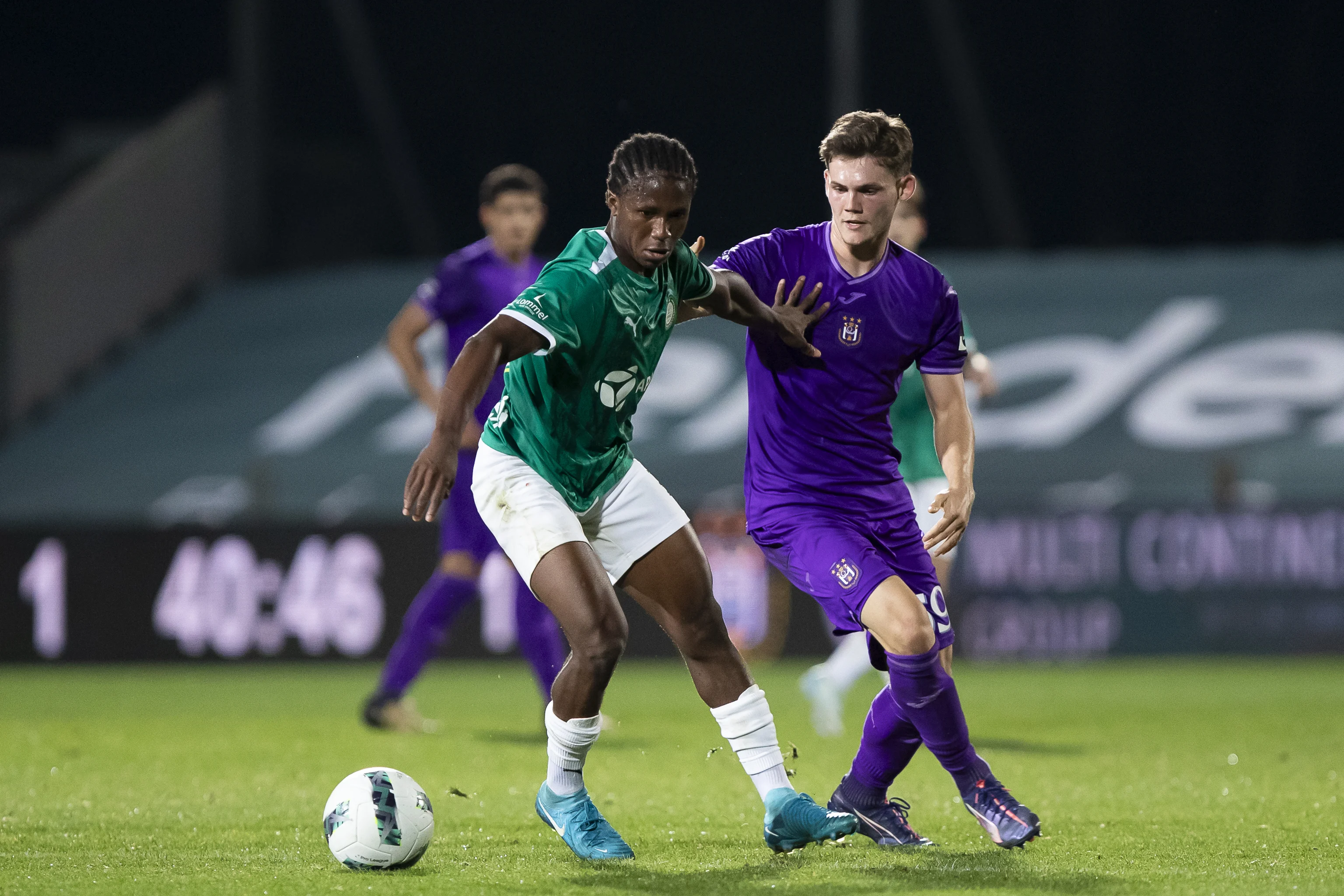 Lommel's Karim Dermane and RSCA Futures' Lilian Vergeylen pictured in action during a soccer match between Lommel SK and RSCA Futures, in Lommel, on day 5 of the 2024-2025 'Challenger Pro League' 1B second division of the Belgian championship, Friday 20 September 2024. BELGA PHOTO KRISTOF VAN ACCOM