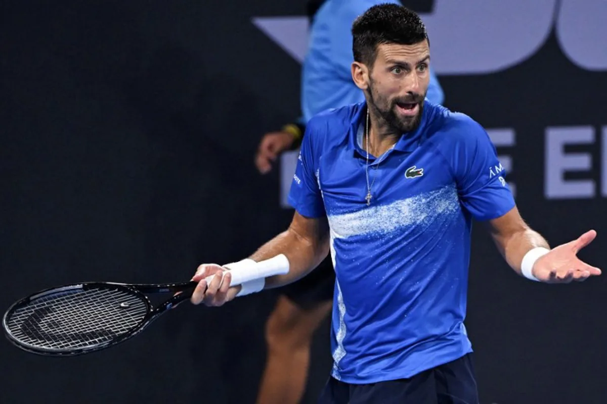 Serbia's Novak Djokovic reacts during his men's singles quarter-final match against USA's Reilly Opelka at the Brisbane International tennis tournament in Brisbane on January 3, 2025.  William WEST / AFP