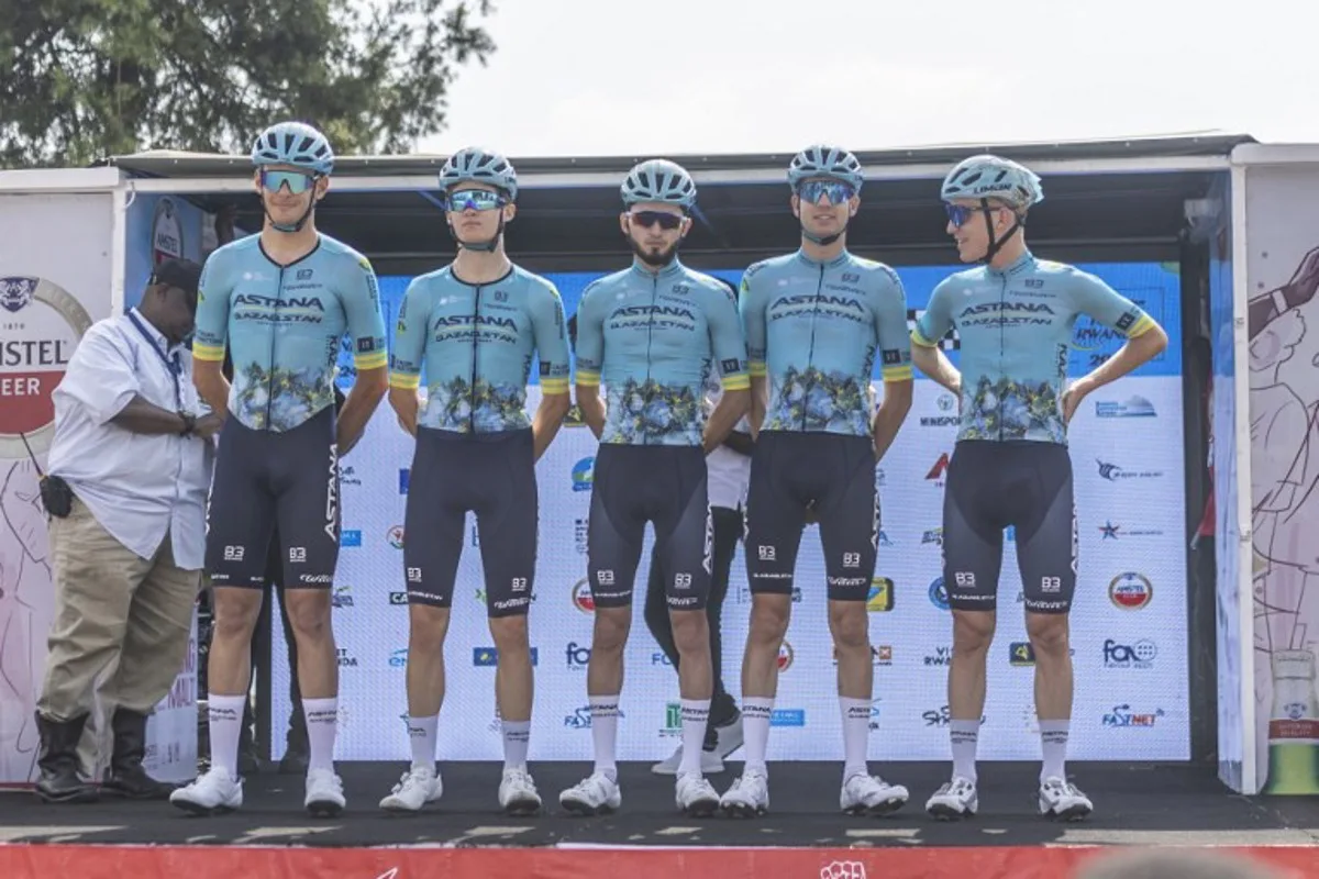 Astana Qazaqstan Development cycling team pose before the beginning of the third stage of the 16th Tour du Rwanda in Huye on February 20, 2024.  Guillem Sartorio / AFP