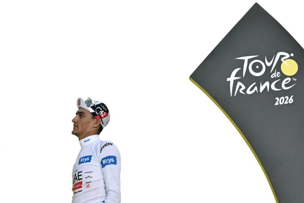 UAE Team Emirates - XRG's Mexican rider Isaac Del Toro celebrates on the podium with the best young rider's white jersey after the 21st stage of the 113th edition of the Tour de France cycling race, 88,7 km starting and finishing in Paris, on July 26, 2026. Jeff PACHOUD / AFP