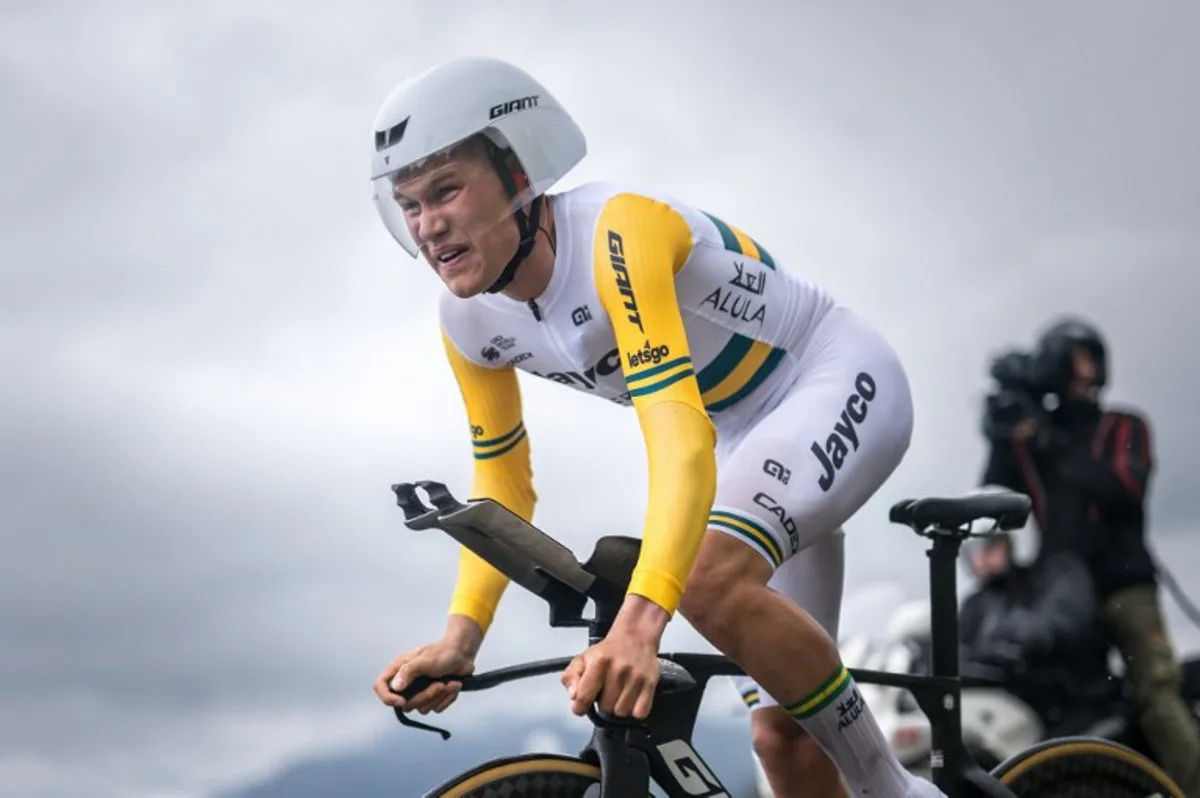 Team Jayco Alula's Australian rider Luke Plapp cycles during the third stage of the Tour of Romandy UCI cycling World tour, a 15.5 km time trial from Oron to Oron, in Maracon, western Switzerland, on April 26, 2024.  Fabrice COFFRINI / AFP