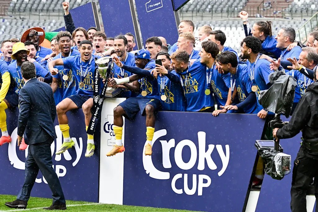 Union's players celebrate with the cup after winning a soccer game between Royale Union Saint-Gilloise and RSC Anderlecht, Thursday 14 May 2026 in Brussels, the final of the 'Croky Cup' Belgian soccer cup. BELGA PHOTO TOM GOYVAERTS