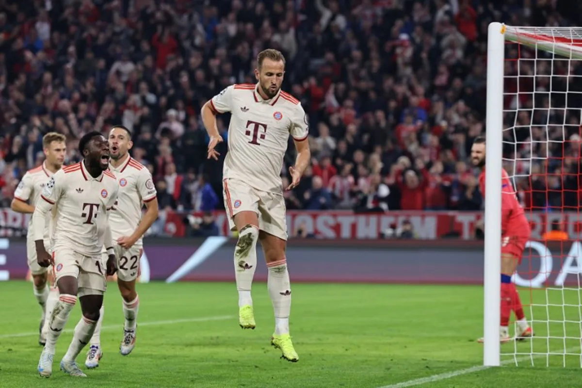 Bayern Munich's English forward #09 Harry Kane celebrates scoring the 4-2 goal with his teammates during the UEFA Champions League football match FC Bayern Munich vs GNK Dinamo Zagreb in Munich, southern Germany, on September 17, 2024.  Alexandra BEIER / AFP