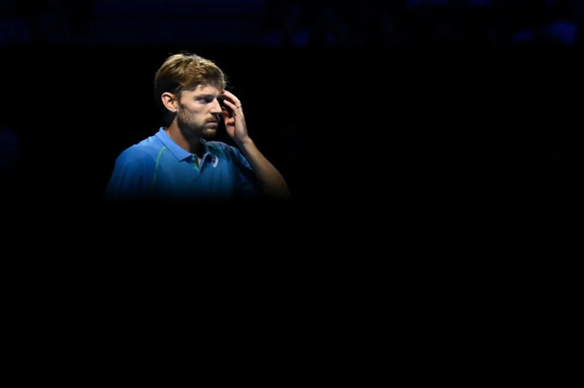 Belgium's David Goffin reacts during the men's singles quarter-final match against Denmark's Holger Rune at the Swiss Indoors ATP 500 tennis tournament in Basel on October 25, 2024.  Fabrice COFFRINI / AFP