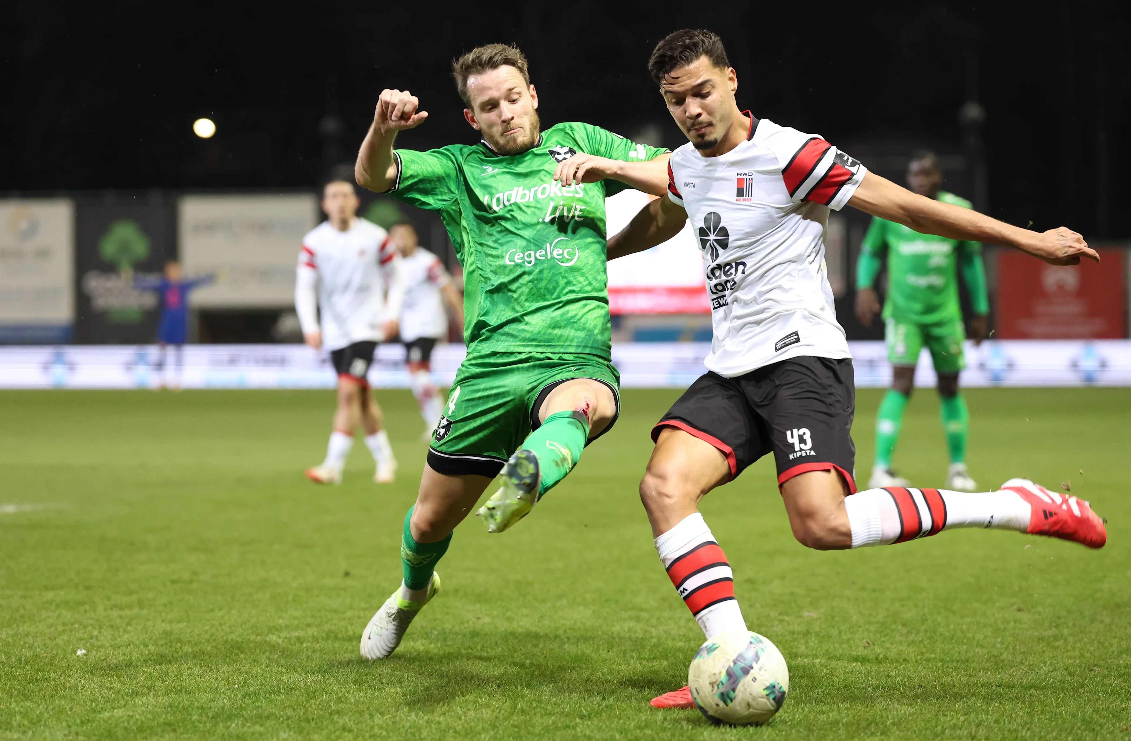 Francs Borains' Christophe Janssens and Rwdm's David Sousa fight for the ball during a soccer match between RWD Molenbeek and Royal Francs Borains, Friday 21 February 2025 in Brussels, on day 23 of the 2024-2025 'Challenger Pro League' second division of the Belgian championship. BELGA PHOTO VIRGINIE LEFOUR