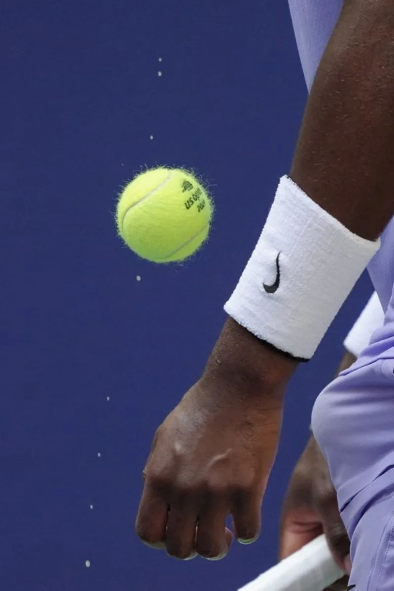 USA's Frances Tiafoe prepares to serve to Kazakhstan's Alexander Shevchenko during their men's singles second round tennis match on day three of the US Open tennis tournament at the USTA Billie Jean King National Tennis Center in New York City, on August 28, 2024.  TIMOTHY A. CLARY / AFP