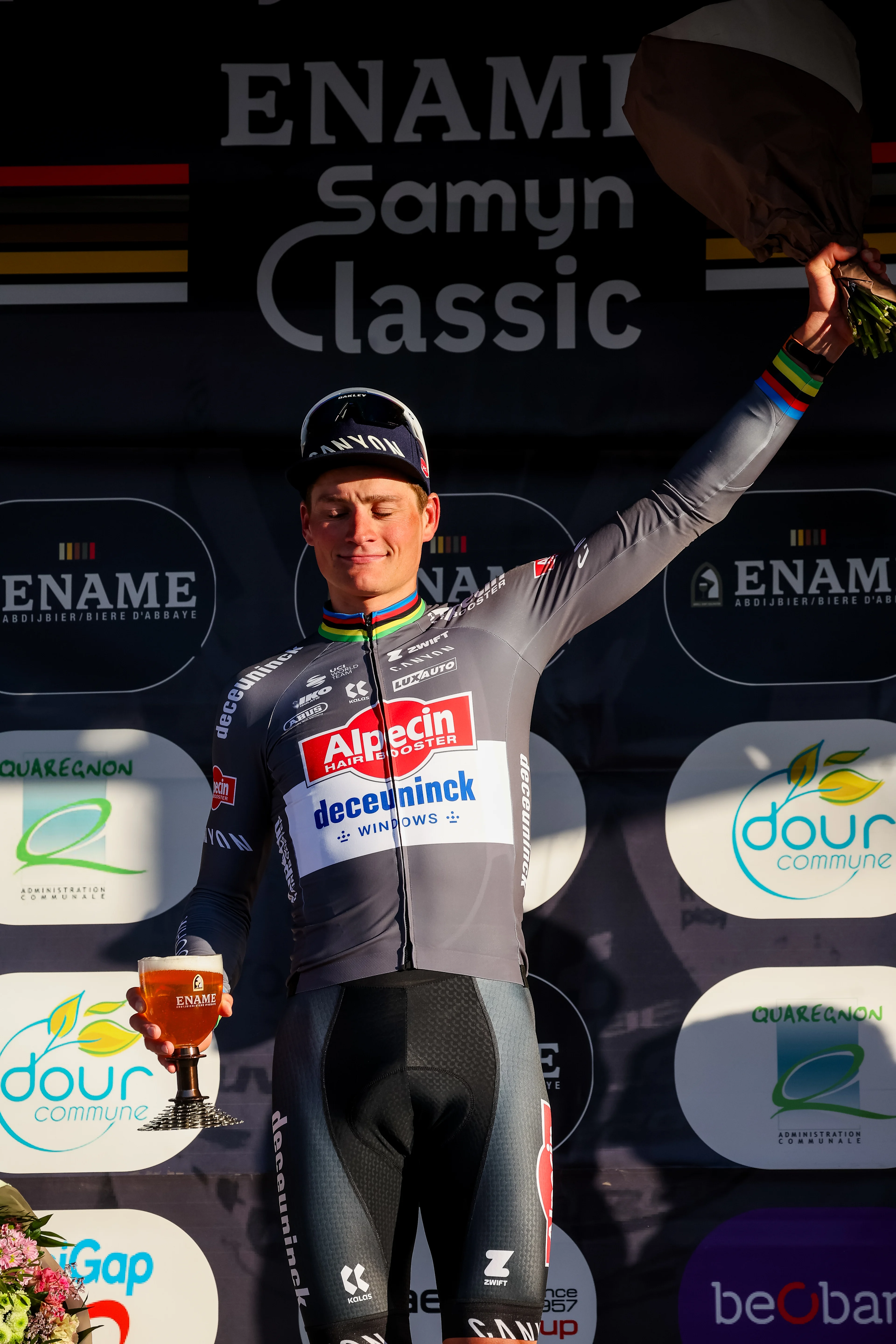 Dutch Mathieu van der Poel of Alpecin-Deceuninck celebrates on the podium after winning the 'Ename Samyn Classic' one day cycling race, 199,1km from Quaregnon to Dour on Tuesday 04 March 2025. BELGA PHOTO VIRGINIE LEFOUR