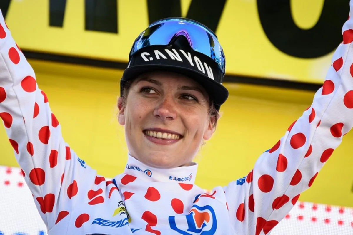 Fenix-Deceuninck's Dutch rider Yara Kastelijn celebrates on the podium with the best climber's dotted jersey at the end of the fifth stage (out of 8) of the second edition of the Women's Tour de France cycling race 126,5 km between Onet-Le-Chateau and Albi, south-western France, on July 27, 2023.  Jeff PACHOUD / AFP