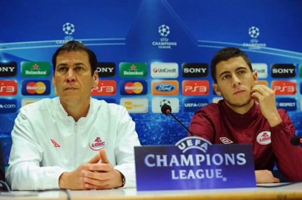 Lille's French midfielder Eden Hazard (R) and Lille's French coach Rudi Garcia answers journalists' questions during a press conference on November 1, 2011 on the eve of the Champions League football match between Inter Milan and Lille, in Appiano Gentile. AFP PHOTO / OLIVIER MORIN