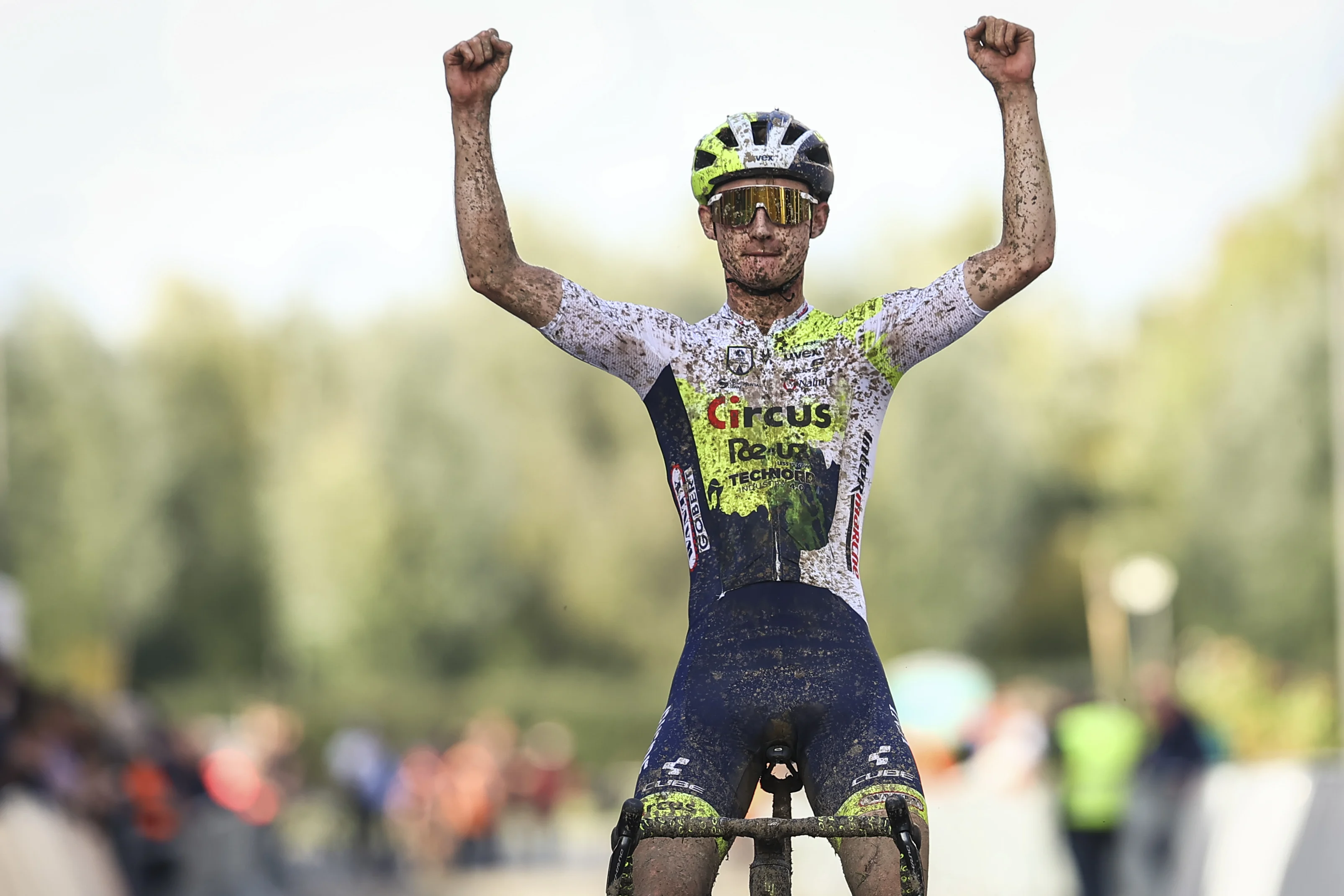 Belgian Gerben Kuypers celebrates as he crosses the finish line to win the men's elite race of the 'Kermiscross' cyclocross cycling event in Ardooie, Thursday 19 October 2023. BELGA PHOTO DAVID PINTENS