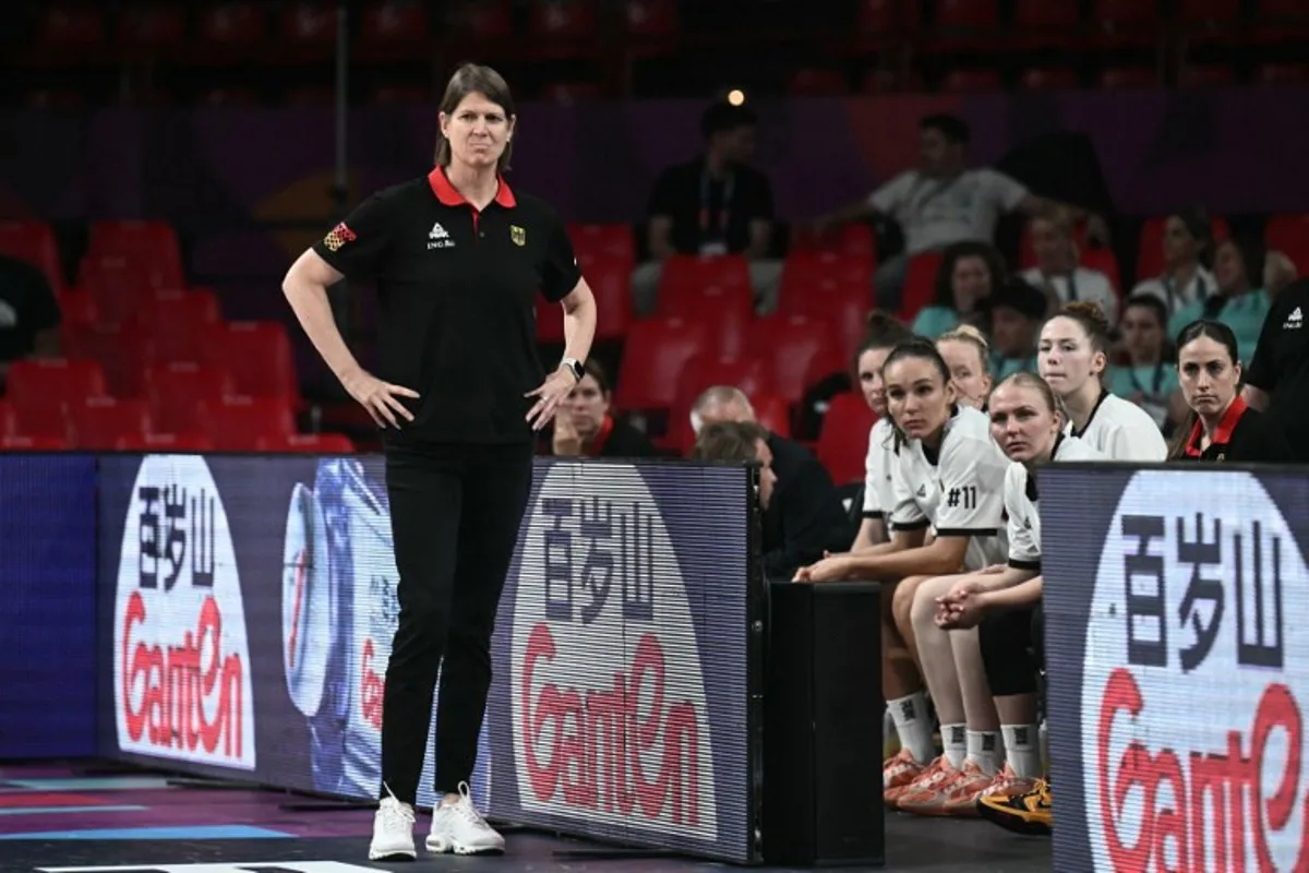 Germany's Canadian head coach Lisa Thomaidis looks on during the FIBA Women's EuroBasket 2025 quarter-final match between Belgium and Germany at the Peace and Friendship Stadium in Piraeus near Athens on June 25, 2025. Angelos Tzortzinis / AFP