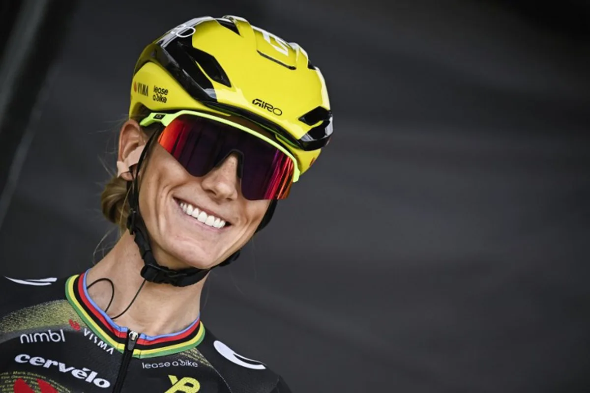 Team Visma | Lease a Bike's French rider Pauline Ferrand-Prevot awaits the start of the 5th stage (out of 9) of the fourth edition of the Women's Tour de France cycling race, 165.8 km from Chasseneuil-du-Poitou to Gueret, central France on July 30, 2025. JULIEN DE ROSA / AFP