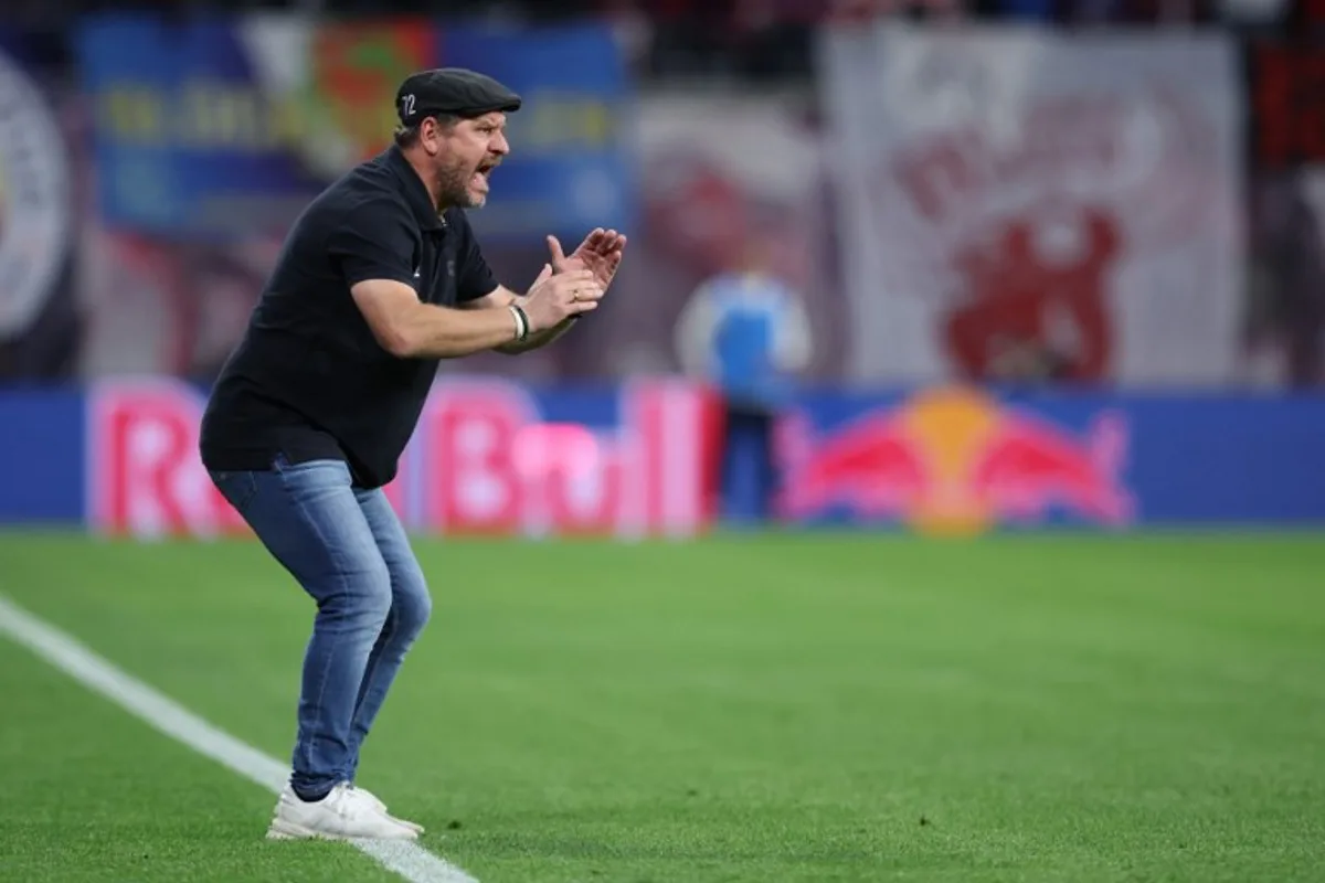 Cologne's German head coach Steffen Baumgart reacts during the German first division Bundesliga football match between RB Leipzig and FC Cologne in Leipzig, eastern Germany on October 28, 2023.  Ronny HARTMANN / AFP