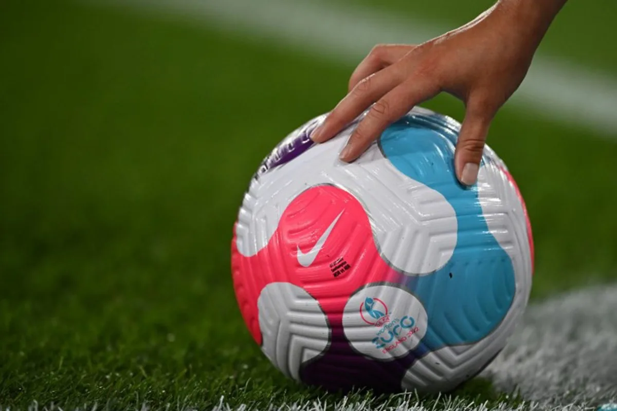 Norway's striker Caroline Graham positions the ball for a corner kick during the UEFA Women's Euro 2022 Group A football match between Norway and Northern Ireland at St Mary's Stadium in Southampton, southern England on July 7, 2022.  Ben Stansall / AFP