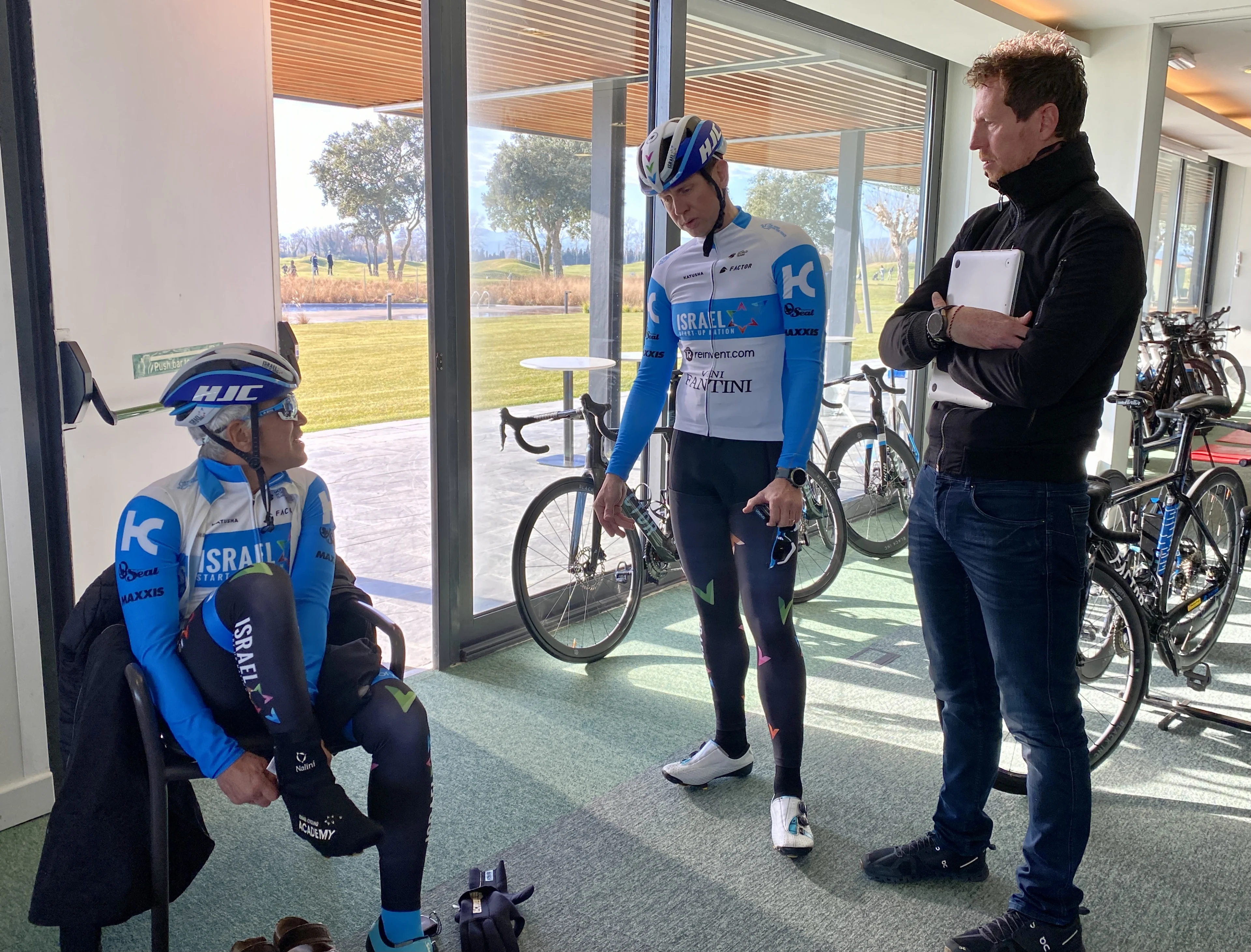 Israel Start-Up Nation co-owner Sylvan Adams, Israel Start-Up Nation general manager Kjell Carlstrom and Israel Start-Up Nation sports director Rik Verbrugghe pictured during the Israel Start-Up Nation cycling team stage in Emporda, in Spain, Sunday 17 January 2021. BELGA PHOTO ANN BRAECKMAN