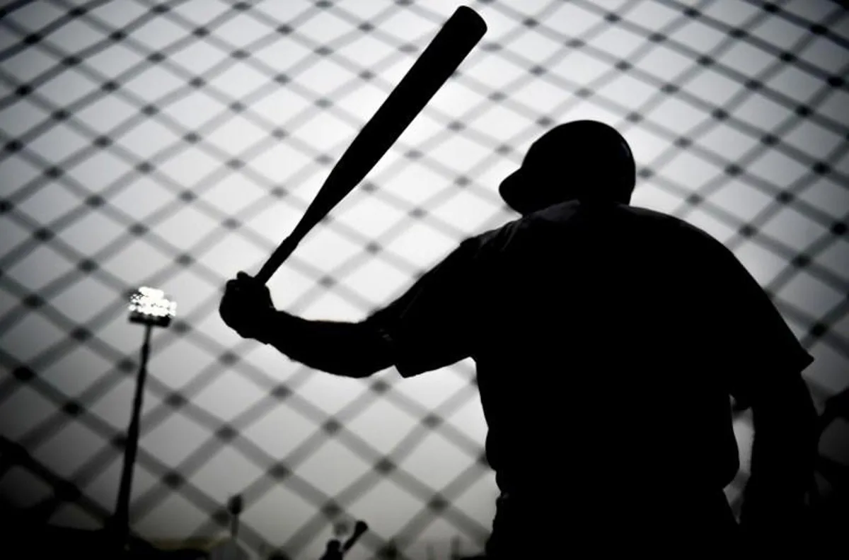 A players warms up before the start of the Softball's Men Grand Final between the US and Argentina during the Lima 2019 Pan-American Games in Lima, on August 1, 2019.  Ernesto BENAVIDES / AFP