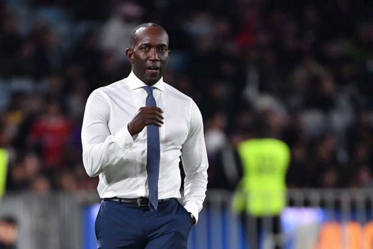 A-League All Stars coach Dwight Yorke reacts during a friendly football match against FC Barcelona football club at the Accor Stadium in Sydney on May 25, 2022.  SAEED KHAN / AFP