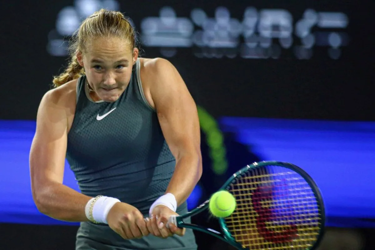 Russia's Mirra Andreeva hits a return to Czech Republic's Karolina Muchova during their women's singles semifinal match at the WTA Ningbo Open tennis tournament in Ningbo, in eastern China's Zhejiang province on October 19, 2024. AFP