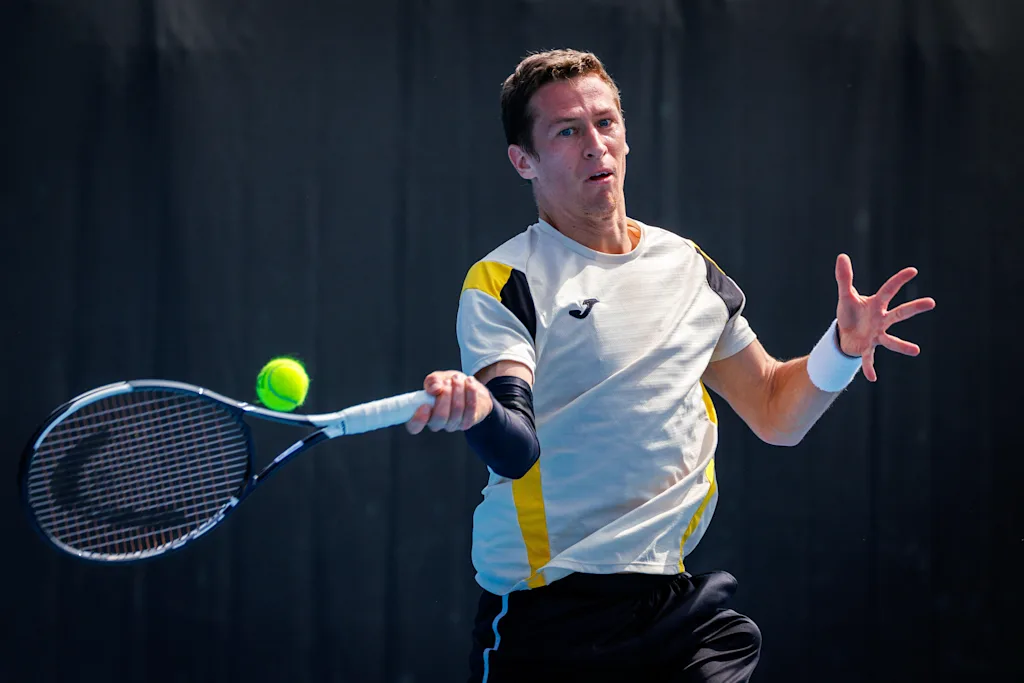Belgium's Kimmer Coppejans pictured in action during a third round qualifying match in the men's singles against USA's Svajda at the Australian Open, Melbourne Park, Melbourne on Thursday 15 January 2026. BELGA PHOTO PATRICK HAMILTON --- BENELUX ONLY ---
