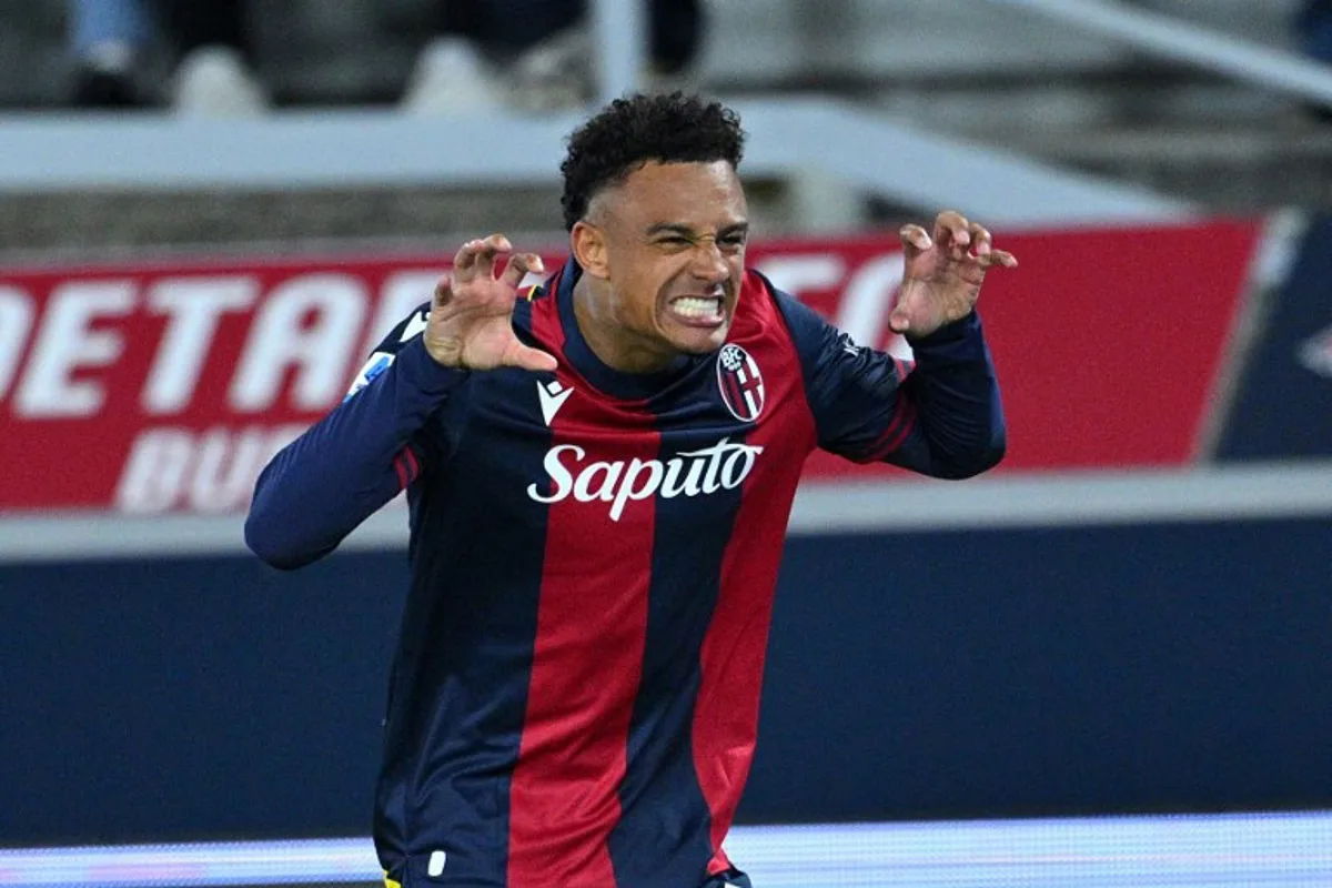 Bologna's Swiss forward #11 Dan Ndoye celebrates after scoring Bologna's first goal during the Italian Serie A football match between Bologna and Napoli at the Renato Dall'Ara stadium in Bologna on April 7, 2025. Andreas SOLARO / AFP