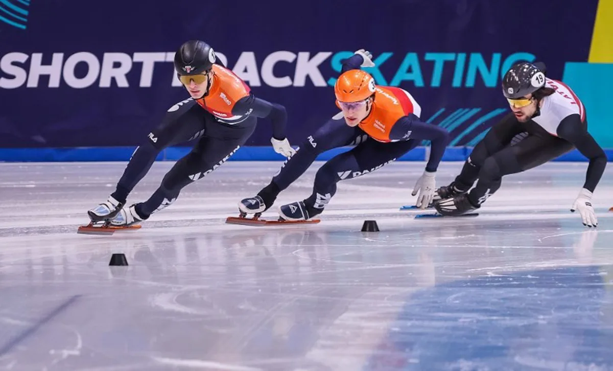 (L-R) Netherlands's Jens van't Wout #13, Netherlands' Daan Kos #38 and Latvia's Roberts Kruzbergs #19 compete during the men's 1500m event on Day 2 of the ISU European short track speed skating Championships in Dresden, eastern Germany, on January 18, 2025.  Ronny HARTMANN / AFP