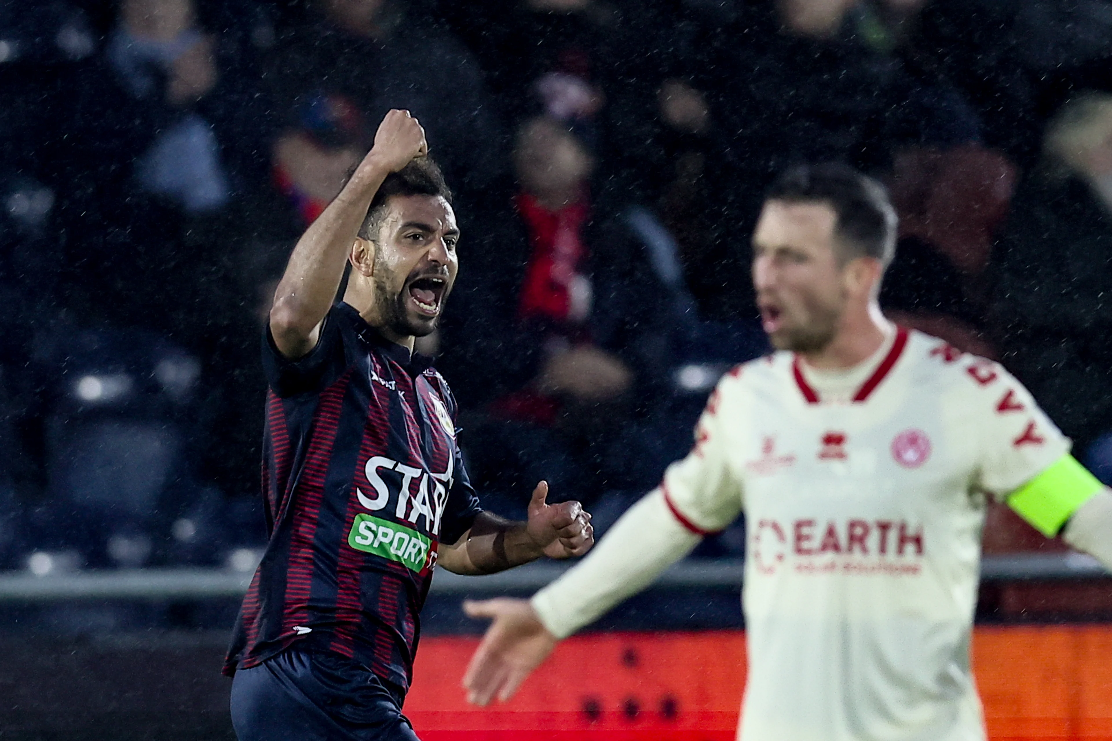 Liege's Pierre-Yves Ngawa celebrates after scoring during a soccer game between RFC Liege and KV Kortrijk, Sunday 07 December 2025 in Liege, on day 16 of the 2025-2026 'Challenger Pro League' 1B second division of the Belgian championship. BELGA PHOTO BRUNO FAHY