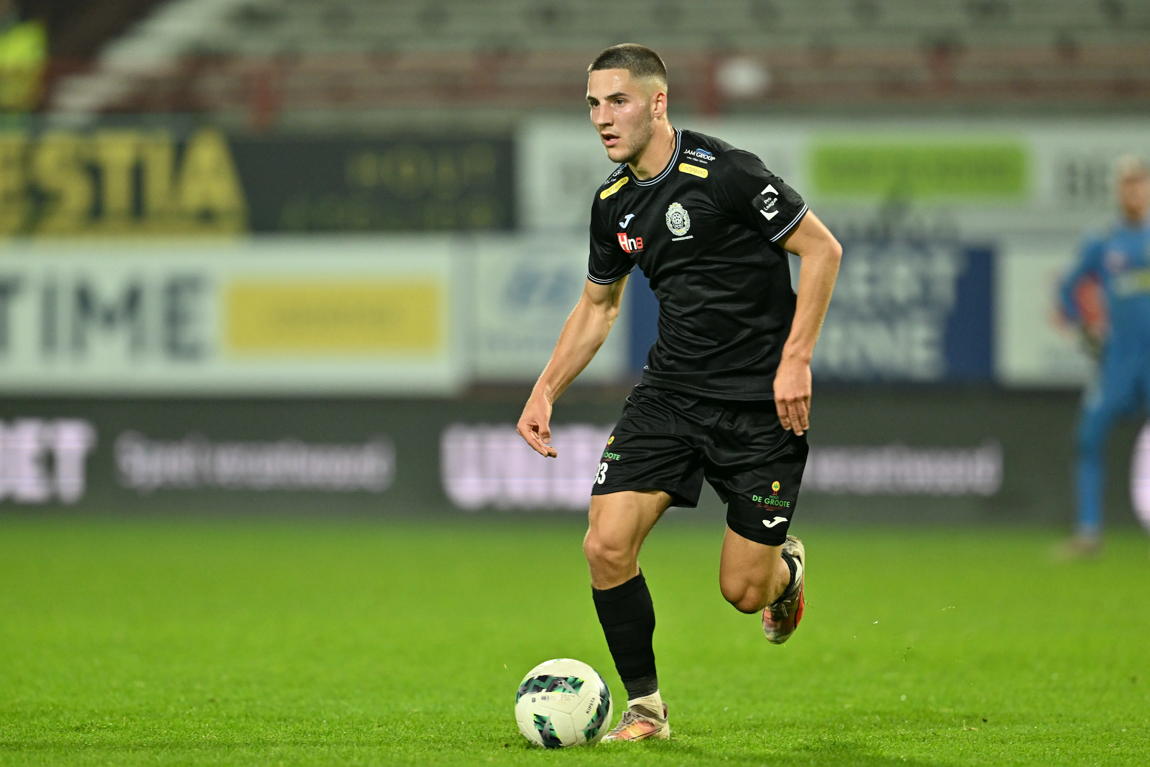 Lokeren's Massimo Decoene pictured in action during a soccer game between JPL club KV Kortrijk and second division club Lokeren-Temse, Wednesday 30 October 2024 in Heule, in the round 1 of 16 of the 'Croky Cup' Belgian soccer cup. BELGA PHOTO DAVID CATRY