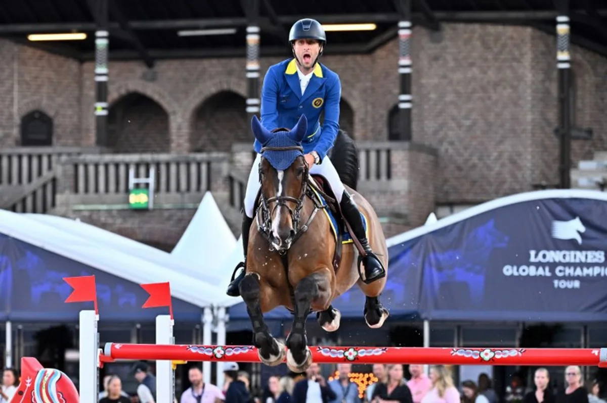 Belgium's Pieter Devos on the horse Nascar van't Siamshof  competes during the Global Champions League 1,60m Round 2 Team Competition of the Longines Global Champions Tour at Stockholm's historic Olympic Stadium, Sweden, on June 29, 2024.  Claudio BRESCIANI / TT News Agency / AFP