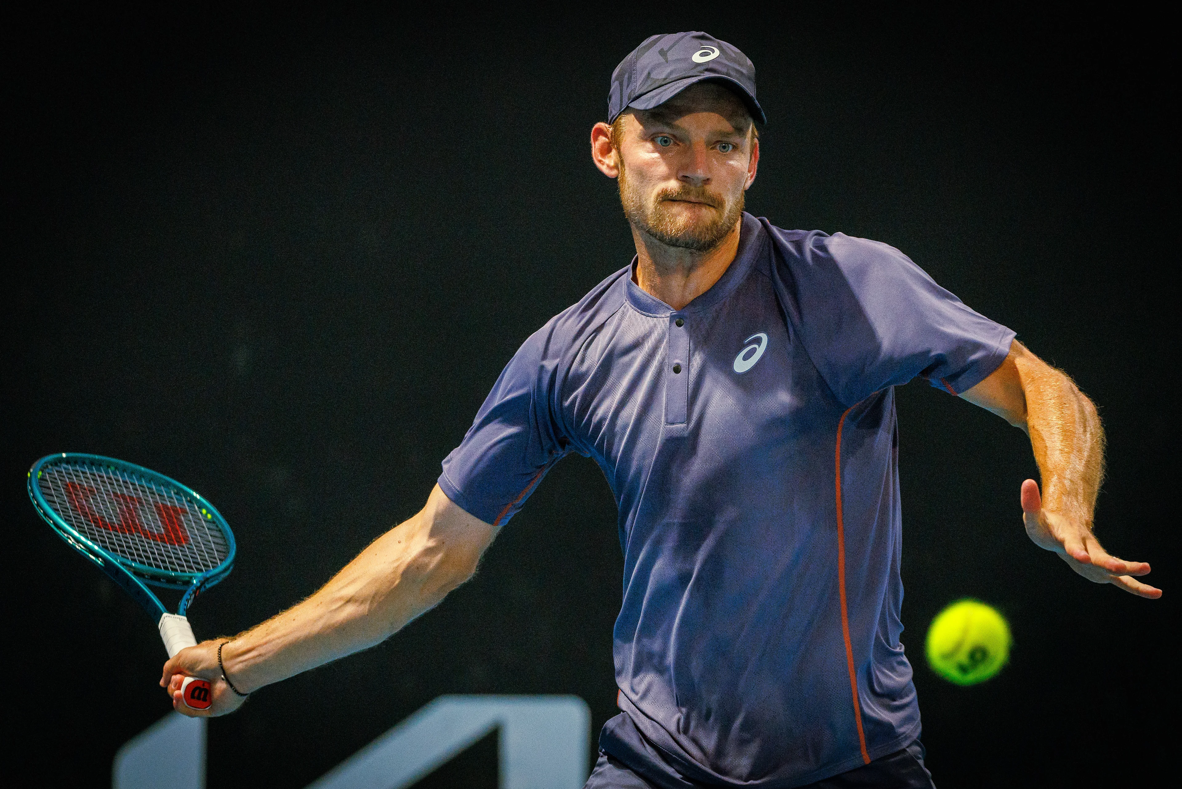 Belgian David Goffin pictured in action during a tennis match between Belgian Goffin and French Bonzi, in the first round of the men's singles at the 'Australian Open' Grand Slam tennis tournament, Monday 13 January 2025 in Melbourne Park, Melbourne, Australia. The 2025 edition of the Australian Grand Slam takes place from January 12th to January 26th. Goffin has lost 1-6, 2-6, 6-7. BELGA PHOTO PATRICK HAMILTON