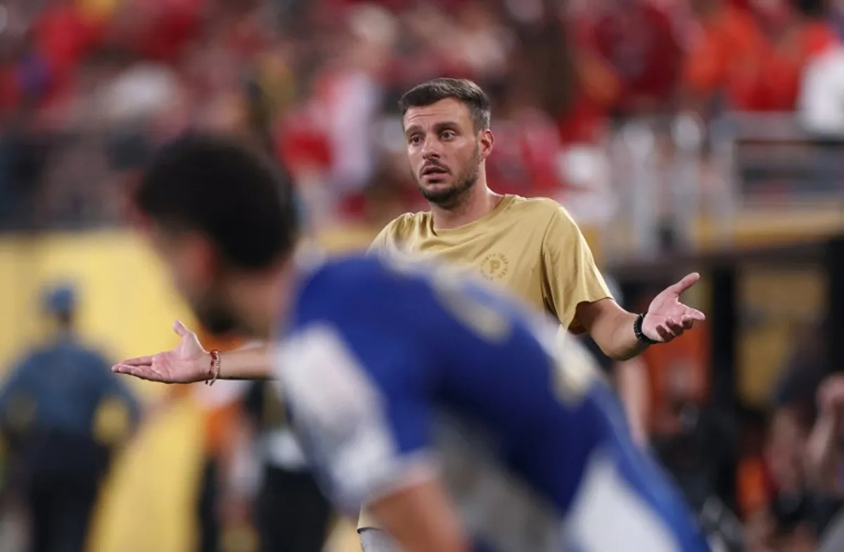 FC Porto's Argentinian coach Martin Anselmi gestures during the FIFA Club World Cup 2025 Group A football match between Portugal's Porto FC and Egypt's Al-Ahly at the MetLife stadium in East Rutherford, New Jersey on June 23, 2025. FRANCK FIFE / AFP
