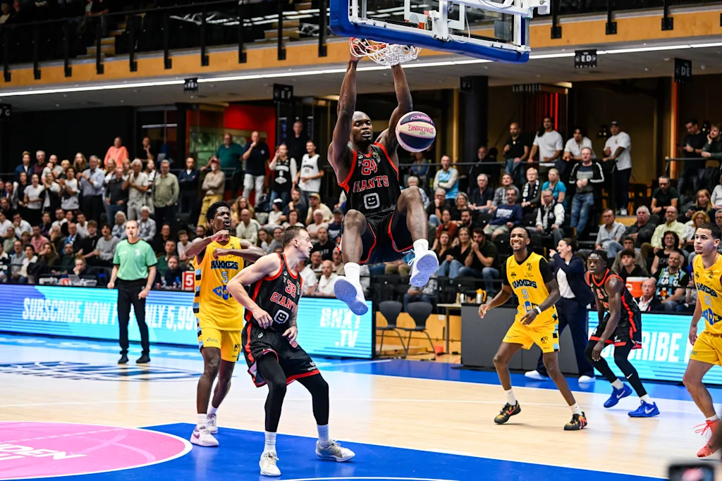 Antwerp's Kevin Tumba scores a dunk during a basketball match between Landstede Hammers and Antwerp Giants, Saturday 26 September 2026 in Zwolle, The Netherlands. The BNXT Supercup is played by the national champion of The Netherlands and Belgium during the previous season. BELGA PHOTO TOM GOYVAERTS