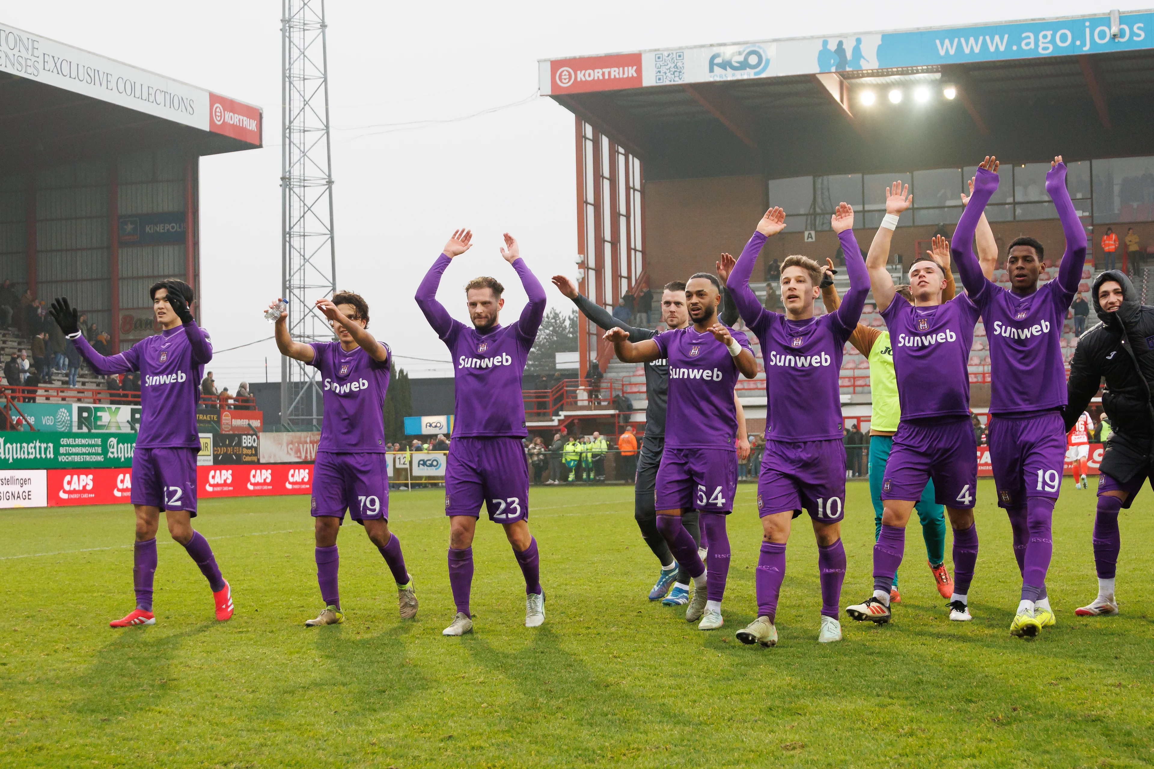 Anderlecht's players celebrate after winning a soccer match between KV Kortrijk and RSC Anderlecht, Sunday 19 January 2025 in Kortrijk, on day 22 of the 2024-2025 season of the 'Jupiler Pro League' first division of the Belgian championship. BELGA PHOTO KURT DESPLENTER