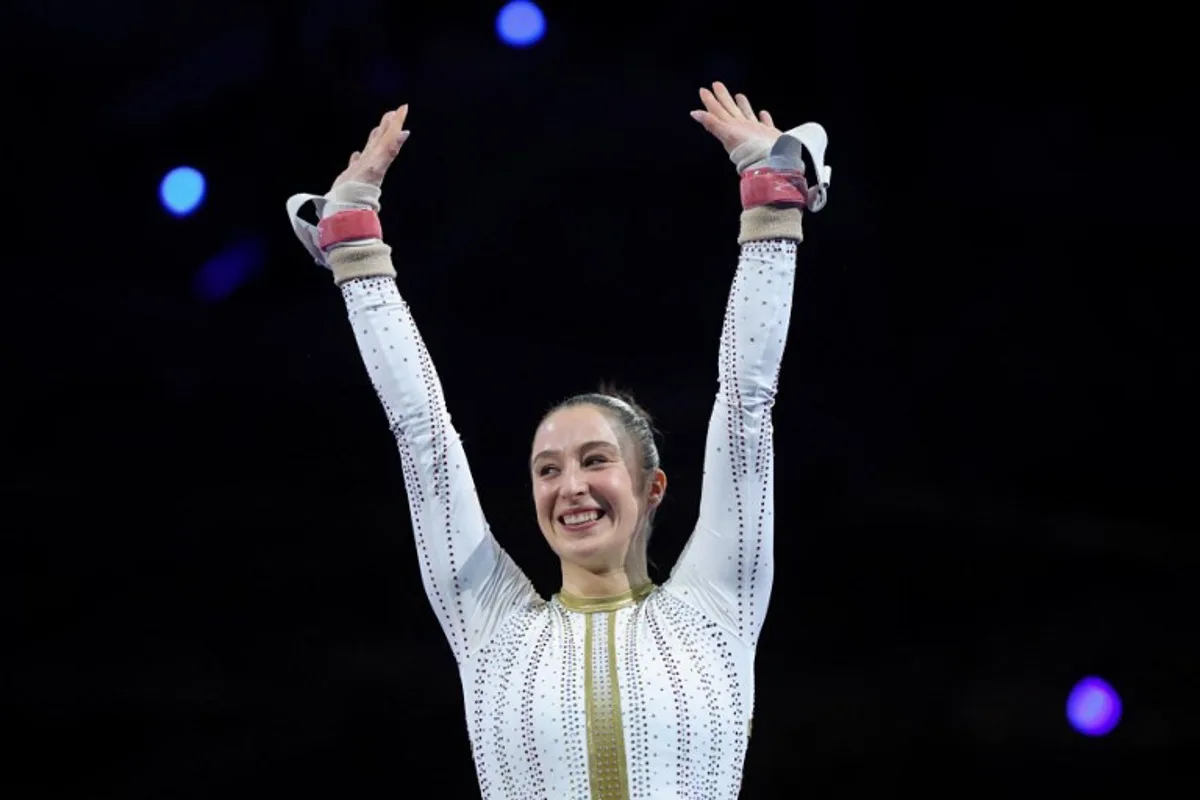 Belgium's Nina Derwael celebrates after winning the women's uneven bars final of the Men's and Women's Artistic Gymnastics European Championships in Leipzig, eastern Germany on May 30, 2025.  Ronny HARTMANN / AFP