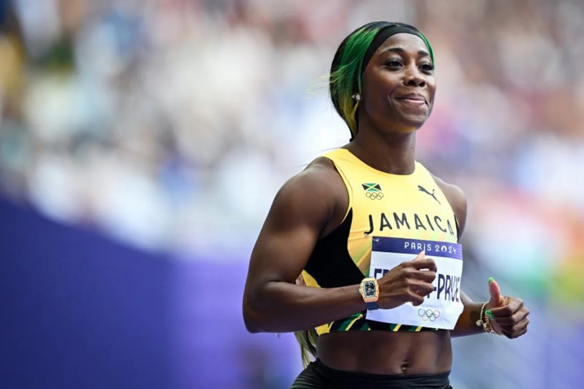 Jamaica's Shelly-Ann Fraser-Pryce competes in the women's 100m heat of the athletics event at the Paris 2024 Olympic Games at Stade de France in Saint-Denis, north of Paris, on August 2, 2024. Andrej ISAKOVIC / AFP