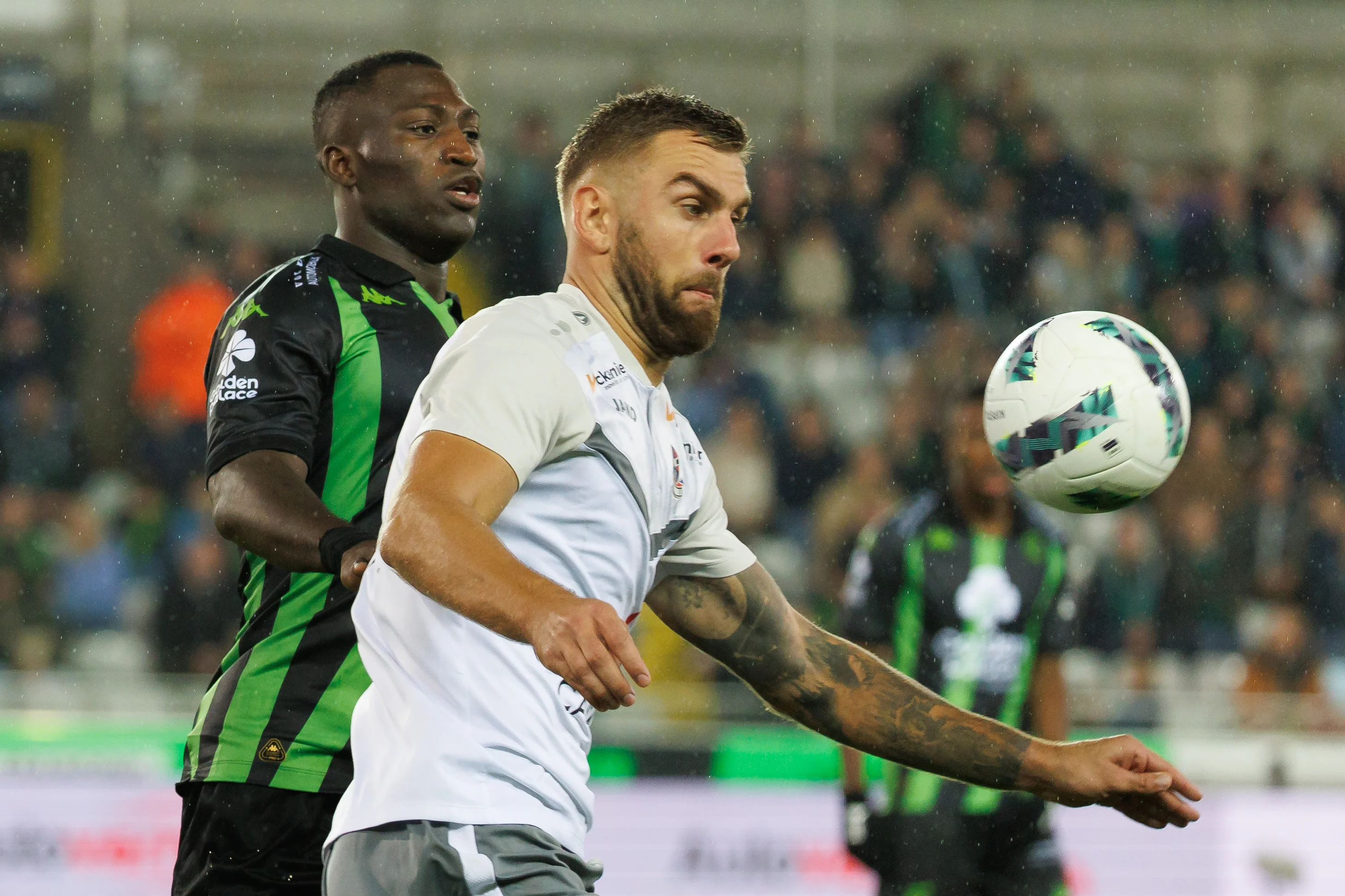 Cercle's Kevin Denkey and Dender's Kobe Cools fight for the ball during a soccer match between Cercle Brugge and FCV Dender EH, Saturday 19 October 2024 in Brugge, on day 11 of the 2024-2025 'Jupiler Pro League' first division of the Belgian championship. BELGA PHOTO KURT DESPLENTER