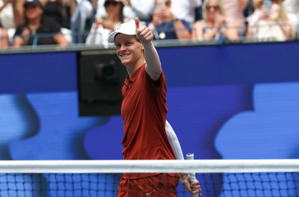 Jannik Sinner of Italy celebrates defeating Vit Kopriva of the Czech Republic in their men's singles first round tennis match on day three of the US Open tennis tournament at the USTA Billie Jean King National Tennis Center in New York City on August 26, 2025. TIMOTHY A. CLARY / AFP