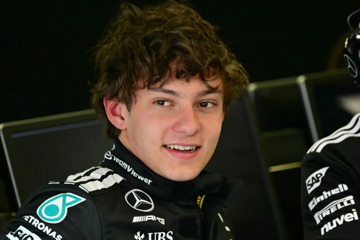 Mercedes' Italian driver Andrea Kimi Antonelli looks on as he speaks to mechanics on the first day of the Formula One pre-season testing at the Bahrain International Circuit in Sakhir on February 26, 2025.  Giuseppe CACACE / AFP