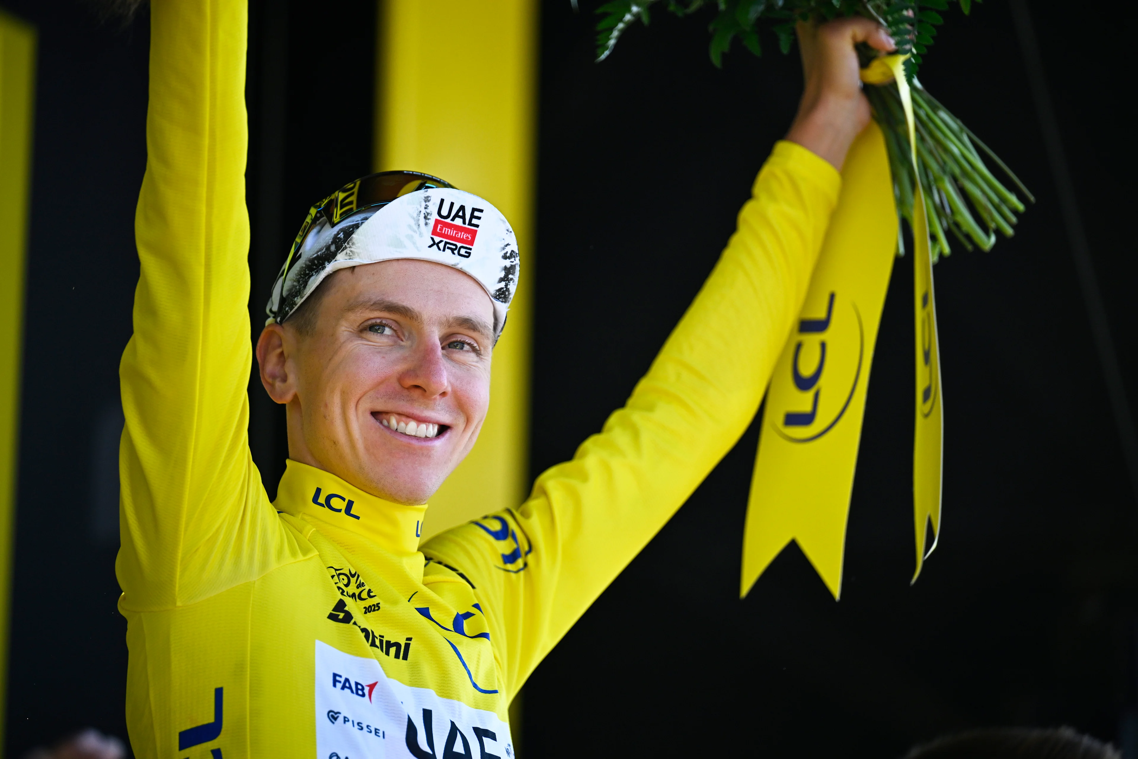 Slovenian Tadej Pogacar of UAE Team Emirates celebrates on the podium after winning stage 13 of the 2025 Tour de France cycling race, an 11km individual time trial from Loudenvielle to Peyragudes, on Friday 18 July 2025 in France. The 112th edition of the Tour de France starts on Saturday 5 July in Lille, France, and will finish in Paris, France on the 27th of July. BELGA PHOTO JASPER JACOBS