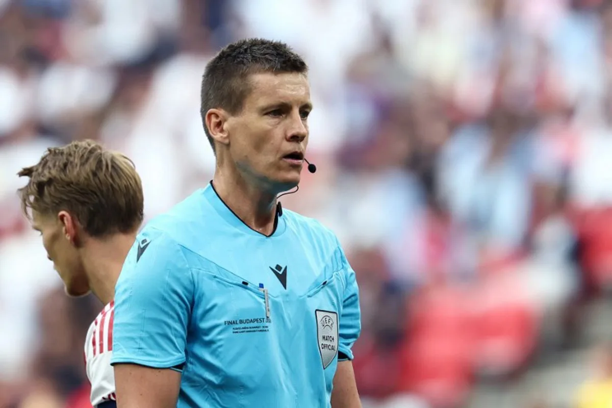 German referee Daniel Siebert looks on during the UEFA Champions League final football match between Paris Saint-Germain (PSG) and Arsenal FC at the Puskas Arena in Budapest on May 30, 2026.   FRANCK FIFE / AFP