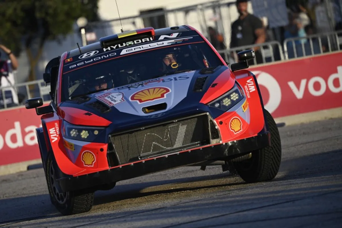 Hyundai Belgian driver and co-driver Thierry Neuville and Martijn Wydaeghe compete in their Hyundai i20 N Rally1 Hybrid during the WRC Rally of Portugal SS1 in Figueira da Foz on May 9, 2024.  MIGUEL RIOPA / AFP